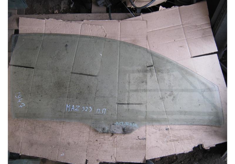 Стекло передней правой двери Mazda 323 C