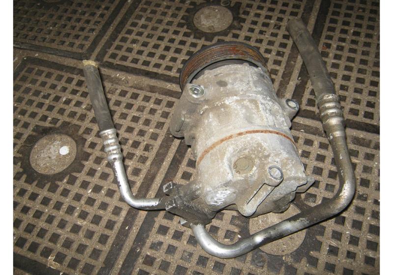 Компрессор кондиционера Opel Corsa D