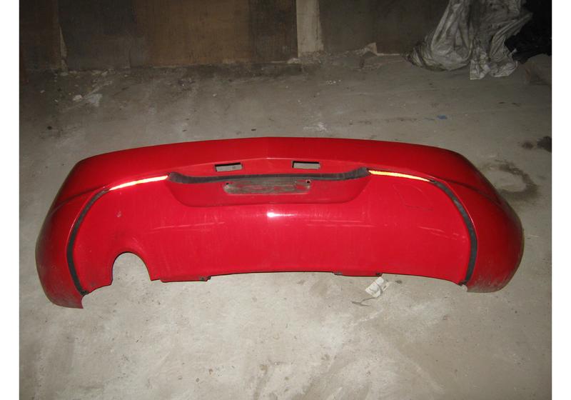 Бампер задний Opel Astra J