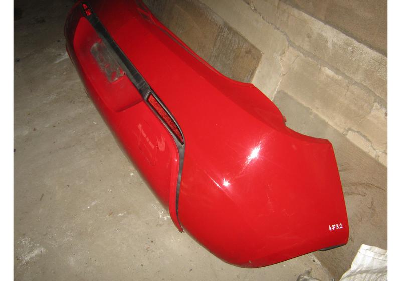 Бампер задний Opel Astra J