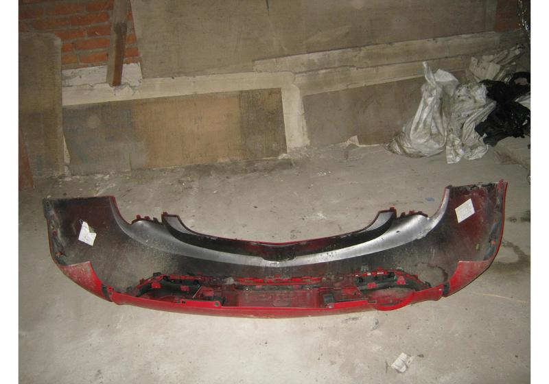 Бампер задний Opel Astra J
